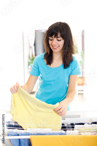 Photo: Smiling young housewife Smiling young housewife