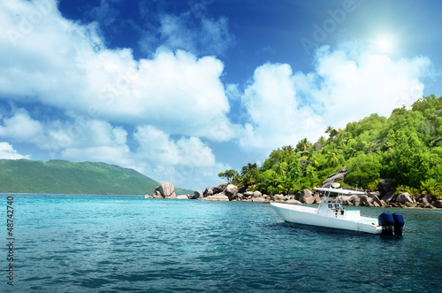 Photo: speed boat on the beach of La Digue Island, Seychelles speed boat on the beach of La Digue Island, Seychelles