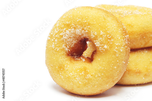 Photo: donuts with sugar on white background donuts with sugar on white background