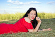 Woman lying on the grass