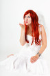 Red-haired woman as an angel