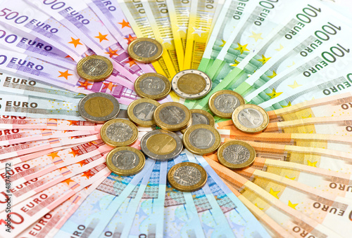 Photo: euro coins and banknotes euro coins and banknotes