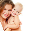 Young mother hugging baby