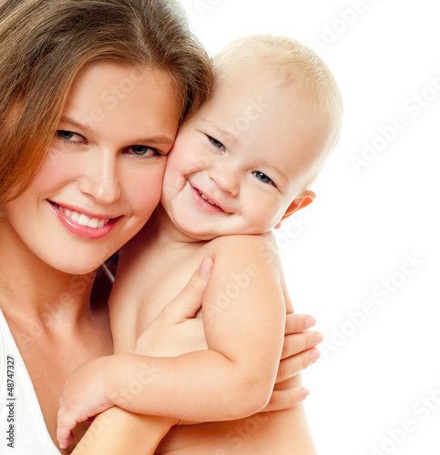 Photo: Young mother hugging baby Young mother hugging baby