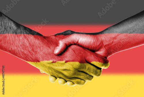 Photo: Man and woman shaking hands Man and woman shaking hands