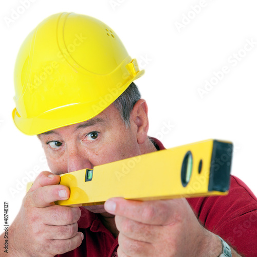 Photo: Construction worker with level Construction worker with level