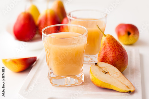 Photo: pear juice and fresh pears pear juice and fresh pears