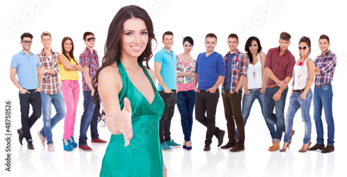 Photo: woman welcoming you with a handshake woman welcoming you with a handshake