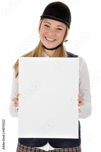 Photo: Junge Reiterin hält leeres Schild Junge Reiterin hält leeres Schild