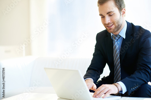 Photo: Man typing Man typing