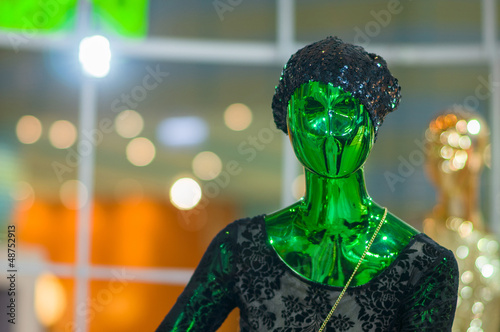 Photo: Modern fashion dressed mannequins with color metall glossy surf Modern fashion dressed mannequins with color metall glossy surf