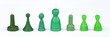 GREEN MONOPOLY FIGURES ON WHITE BACKGROUND
