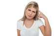 Portrait of a thoughtful teen blonde girl