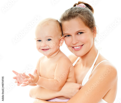 Photo: Young mother hugging baby Young mother hugging baby