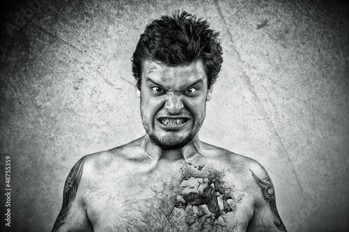 Photo: Sinister face with cracked skin, and ugly face Sinister face with cracked skin, and ugly face