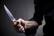 Hand with a knife