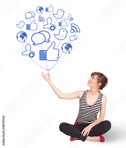 Photo: Happy lady holding social icon balloon Happy lady holding social icon balloon
