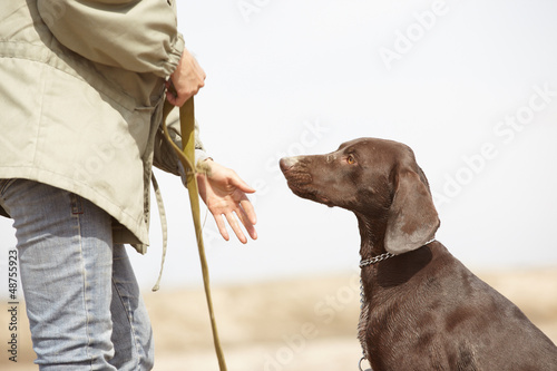 Photo: Dog and trainer Dog and trainer