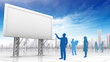 Group of people standing near blank billboard