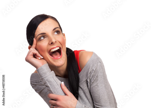Photo: Young woman expressing happiness isolated Young woman expressing happiness isolated