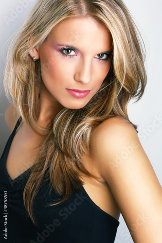 Photo: Portrait of pretty young woman Portrait of pretty young woman