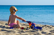 girl playing on beach