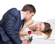 man, woman and red rose