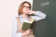 Photo: Germanistik Lehrerin an der Tafel Germanistik Lehrerin an der Tafel