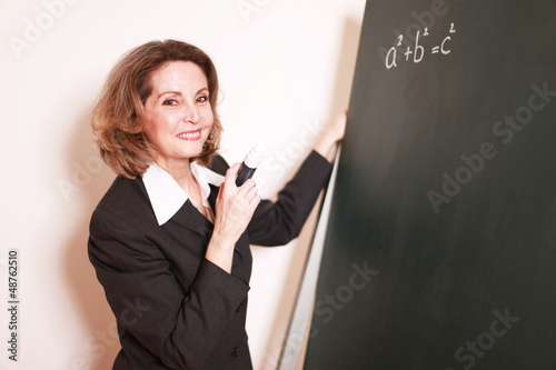 Photo: Mathematik Lehrerin an der Tafel Mathematik Lehrerin an der Tafel