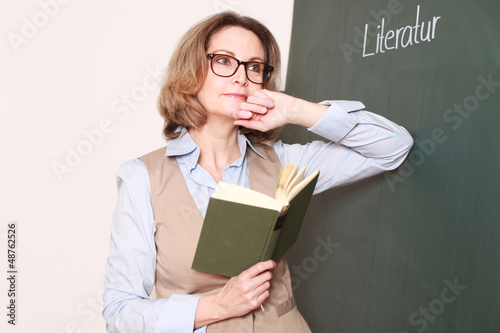 Photo: Germanistik Lehrerin an der Tafel Germanistik Lehrerin an der Tafel