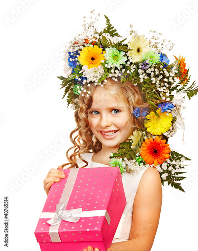 Photo: Child with gift box and flower. Child with gift box and flower.