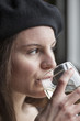 Young Woman Drinking White Wine