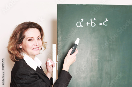 Photo: Mathematik Lehrerin an der Tafel Mathematik Lehrerin an der Tafel