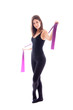 Photo: Young woman with pilates strap in hand Young woman with pilates strap in hand