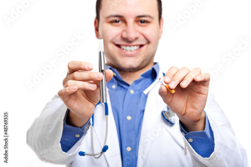 Photo: Doctor holding e-cigarette Doctor holding e-cigarette