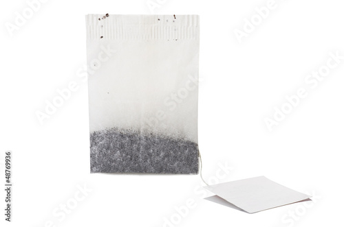 Photo: Tea bag with white label close up Tea bag with white label close up