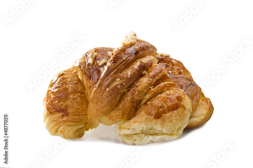 Photo: Fresh and tasty croissant on the white Fresh and tasty croissant on the white
