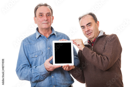 Photo: Two Senior Men with Tablet PC Two Senior Men with Tablet PC