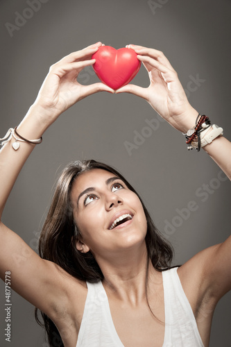 Photo: holding a red heart holding a red heart