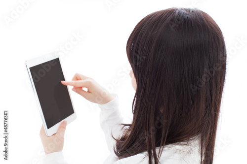 Photo: タブレットPCを使う女の子 タブレットPCを使う女の子