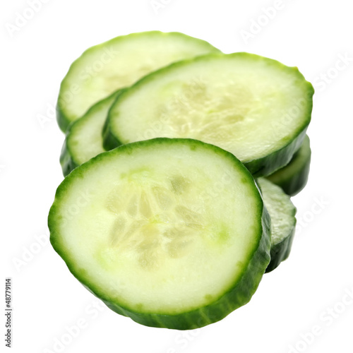 Photo: Cucumber Slices Isolated on White Background Cucumber Slices Isolated on White Background
