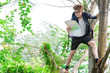 Tourist on tree