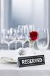Photo: Romantic dinner setting with reserved sign Romantic dinner setting with reserved sign