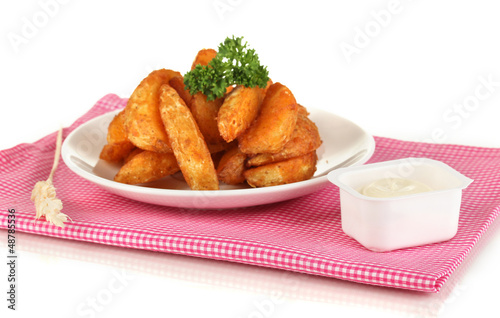 Photo: Appetizing village potatoes on plate isolated on white Appetizing village potatoes on plate isolated on white