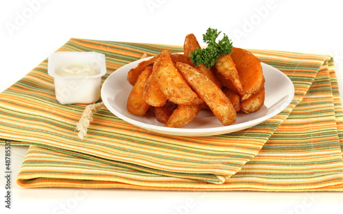 Photo: Appetizing village potatoes on plate isolated on white Appetizing village potatoes on plate isolated on white