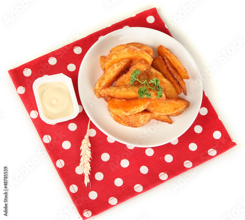 Photo: Appetizing village potatoes on plate isolated on white Appetizing village potatoes on plate isolated on white
