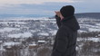 Video: Young woman admire her village in winter time, pan Young woman admire her village in winter time, pan