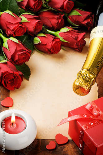 Photo: Valentine's frame with red roses and vintage paper Valentine's frame with red roses and vintage paper