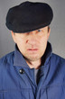 Marginal man in a cap
