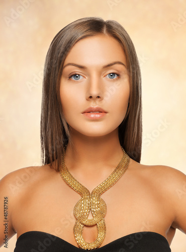 Photo: beautiful woman with necklace beautiful woman with necklace